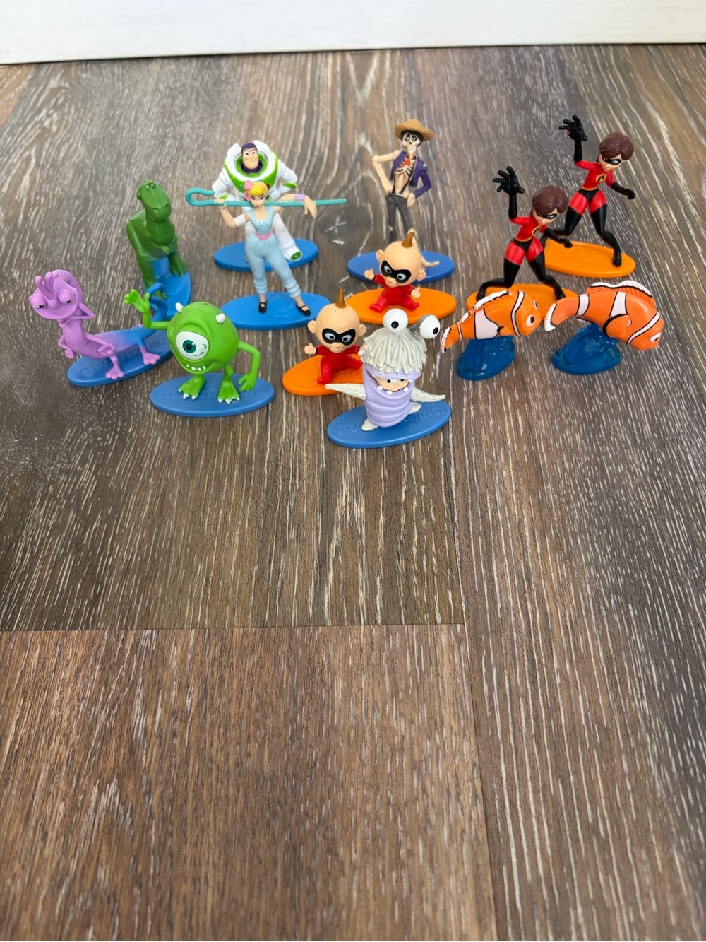 Lot of Disney figurines Monsters, Nemo, Incredibles Toy Story as is